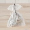 Colgante corazón strass en bolsa de blonda 2 bombones